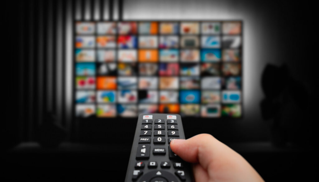 Flix4K TVs streaming experience on modern television with remote control